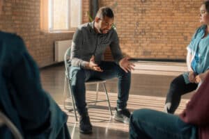Group therapy meeting during intervention services in New Jersey