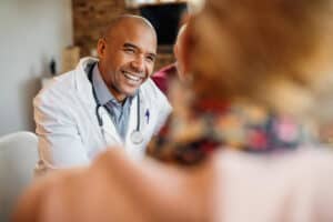 Doctor during home visit as part of MAT New Jersey treatment and recovery support program