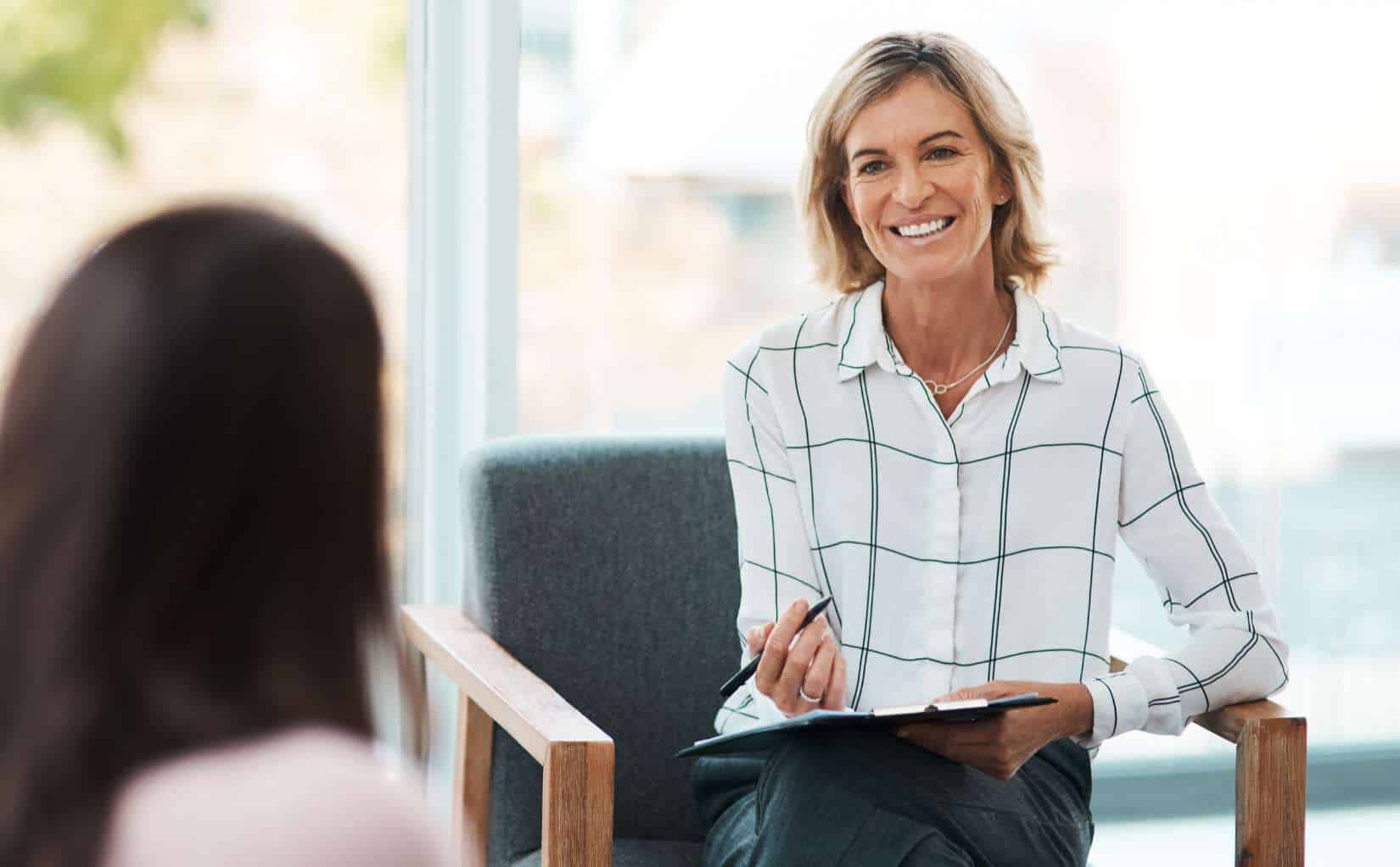 Therapist meeting with a client during mental health treatment in Greensboro, NC.