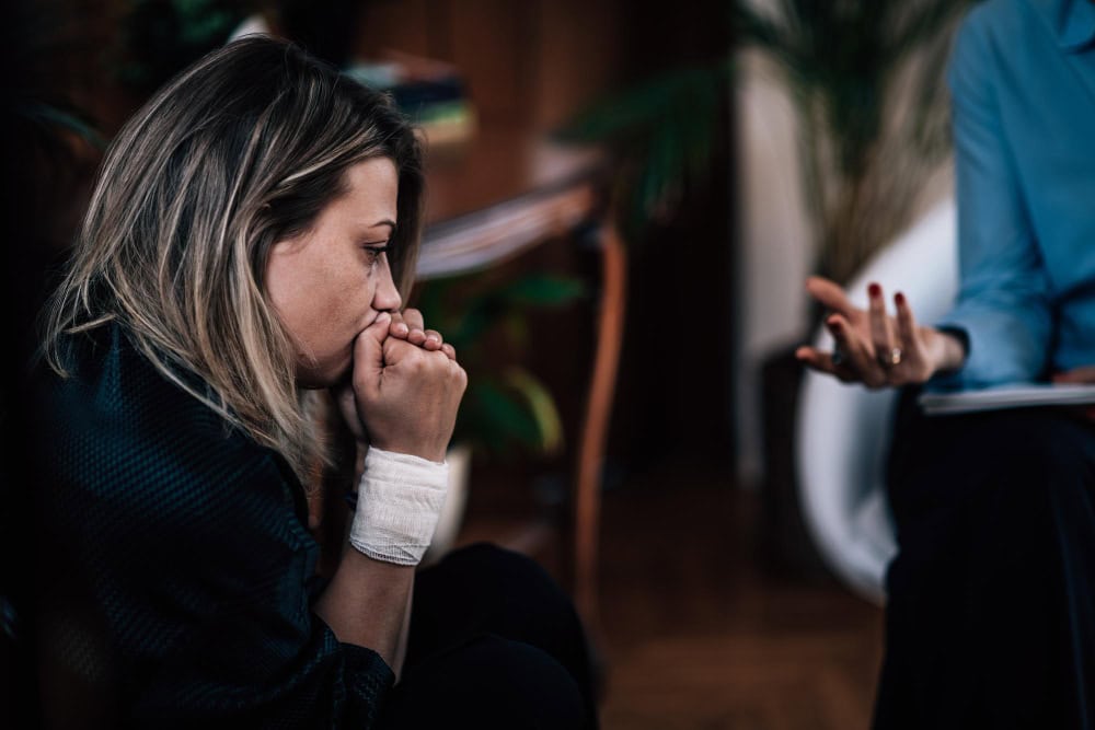 Mental health professional talking with patient during fentanyl addiction treatment in Greensboro NC