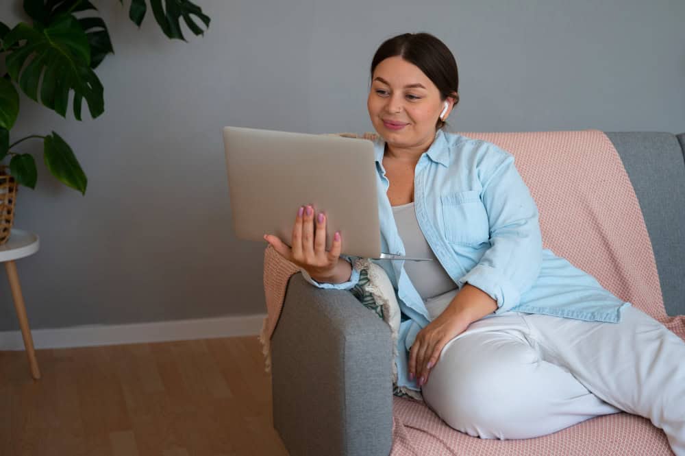 Woman attending virtual therapy session during Virtual Mental Health Treatment in Greensboro NC via laptop