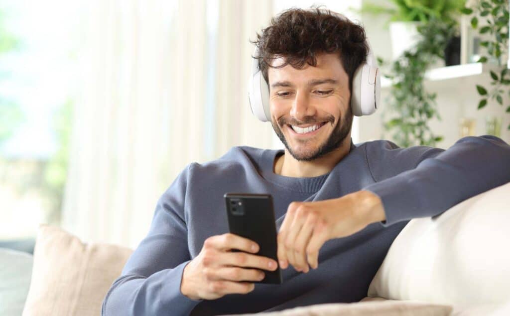 Man in a remote therapy session during virtual addiction treatment in Greensboro, NC.