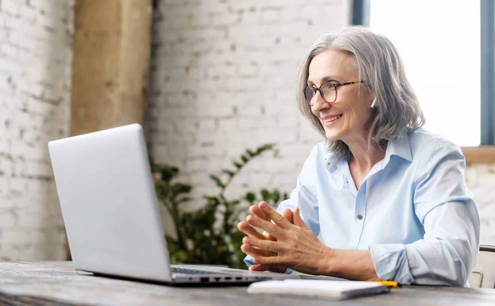 Therapist speaking with a client during virtual addiction treatment in Greensboro, NC.