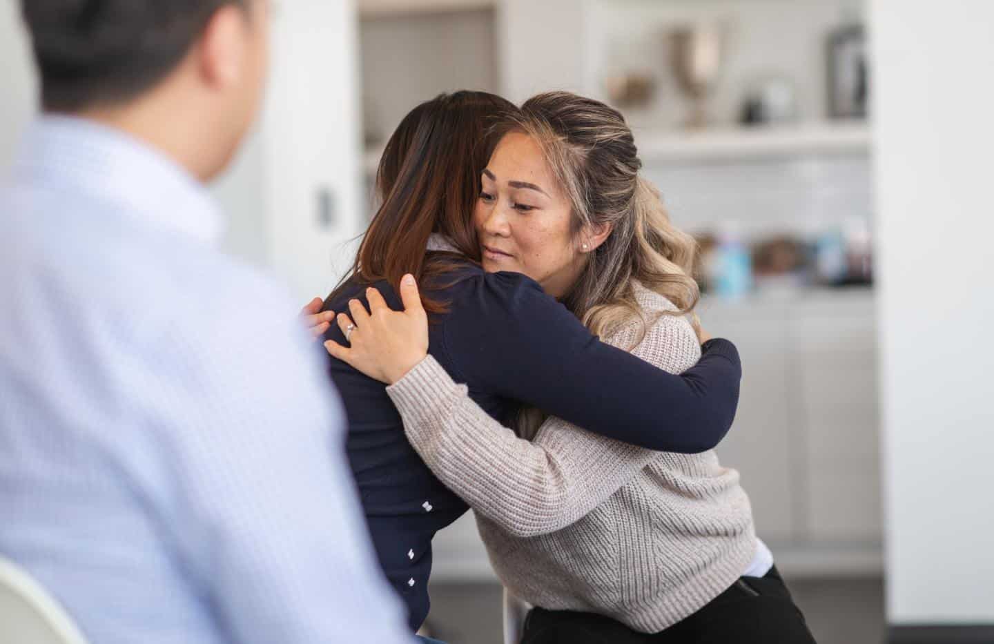 Family members supporting a loved one during depression treatment in Greensboro, NC.